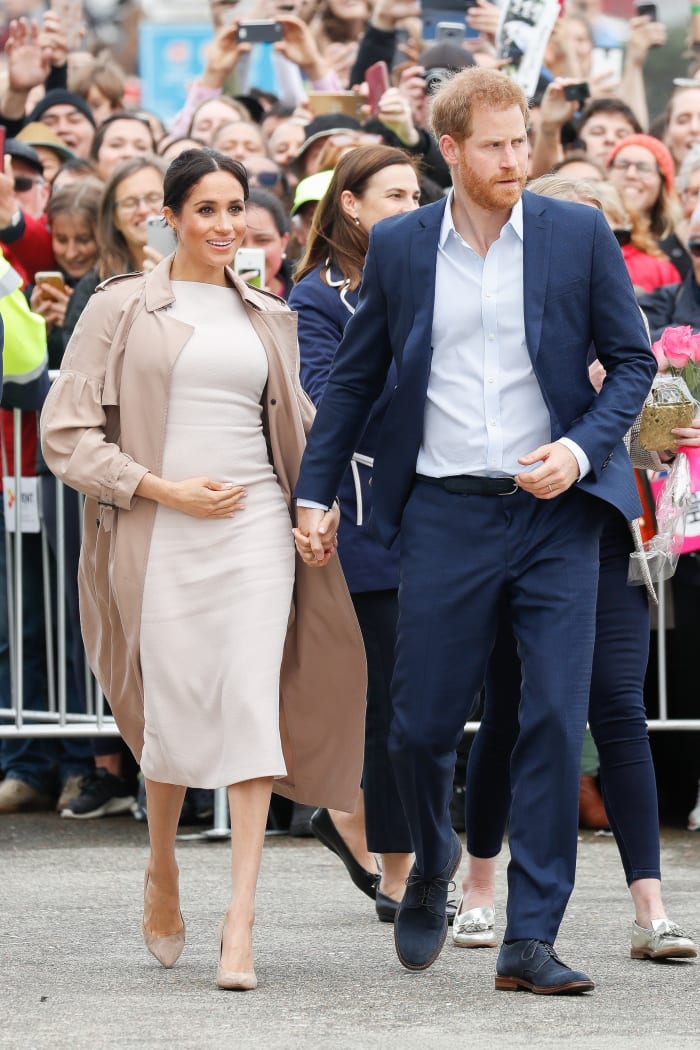 Meghan Markle (in Brandon Maxwell) and Prince Harry during a "walkabout" in Auckland, New Zealand. Photo: Chris Jackson/Getty Images