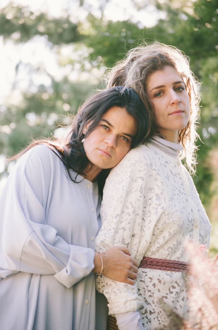 JJ Mitchell and Hana Elion of Overcoats wearing Mr. Larkin, styled by Emily Ruane. Photo: Whitney Bauck/Fashionista