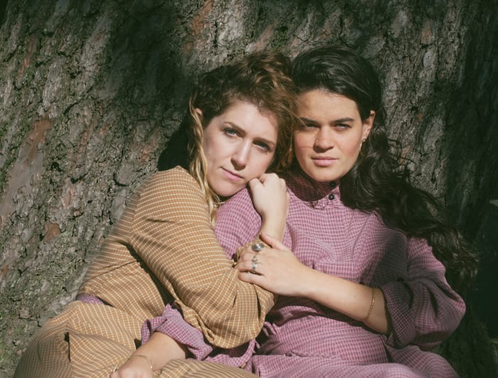 Hana Elion and JJ Mitchell of Overcoats wearing Mr. Larkin, styled by Emily Ruane. Photo: Whitney Bauck/Fashionista