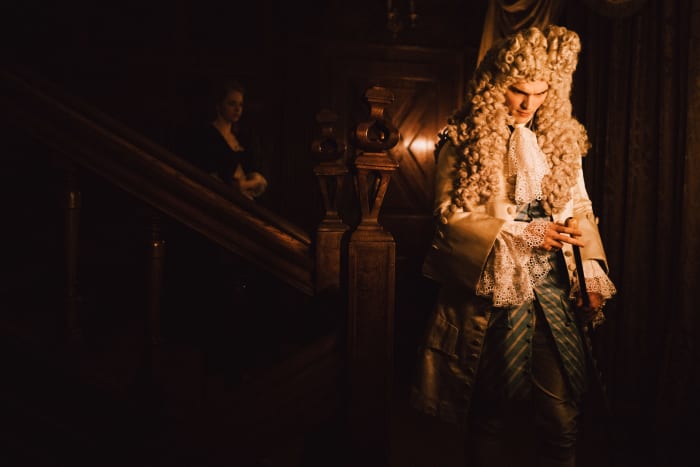 Harley (Nicholas Hoult) with Abigail lurking on the staircase. Photo: Atsushi Nishijima/Twentieth Century Fox Film Corporation