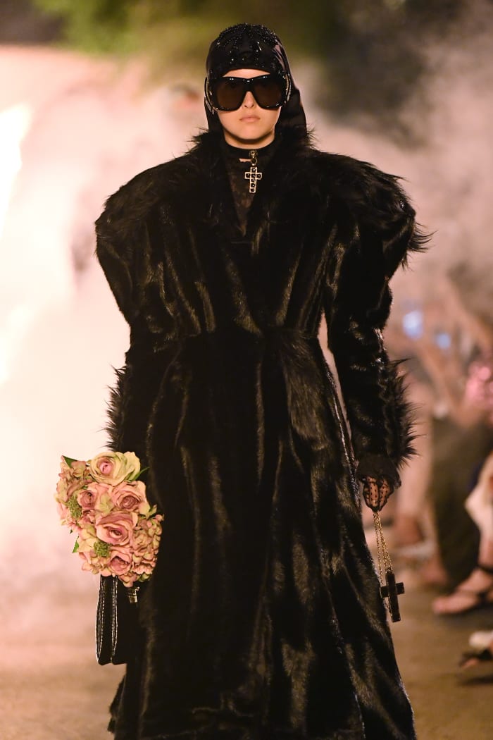 A faux-fur coat on the runway at Gucci's Cruise 2019 show in Arles, France. Photo: Daniele Venturelli/Getty Images