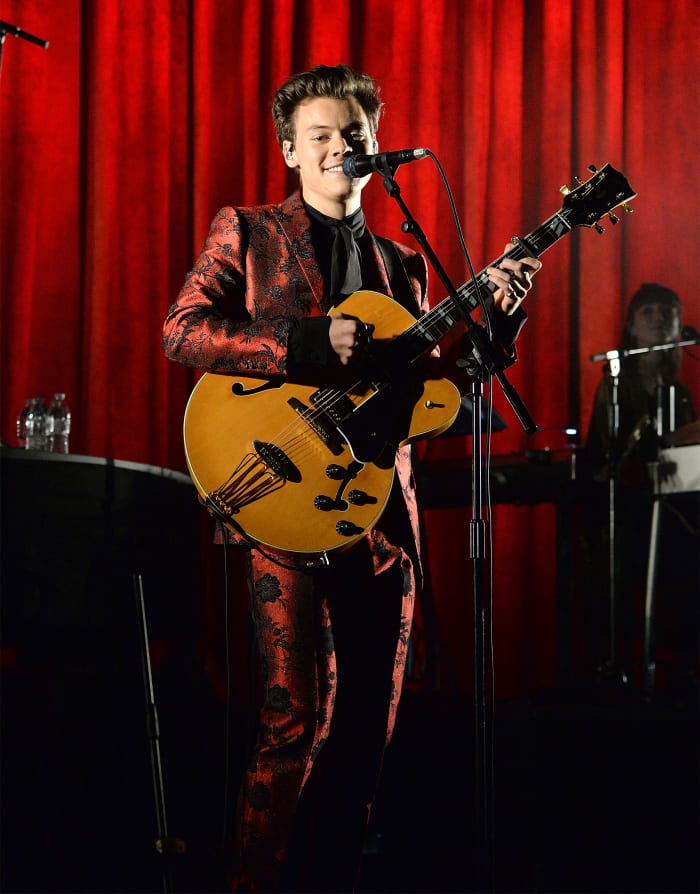 Harry Styles in a custom Gucci metallic floral silk jacquard Monaco suit and silk shirt with self-tie at Radio City Music Hall in New York. Photo: Kevin Mazur/Getty Images for Sony Music