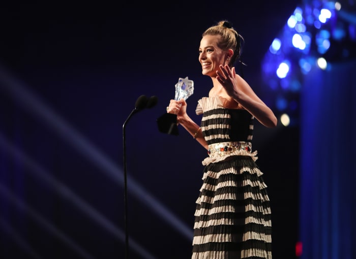 Margot Robbie accepting her Best Actress award in Chanel. Photo: Christopher Polk/Getty Images for The Critics' Choice Awards