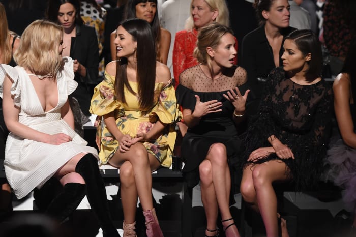 "And General Antiope's archery skills... "Dylan Penn (second from right) and Culpo (far right) presumably discussing the pure badass-ness of Robin Wright at the Marchesa spring 2018 show. Photo: Nicholas Hunt/Getty Images For NYFW: The Shows)