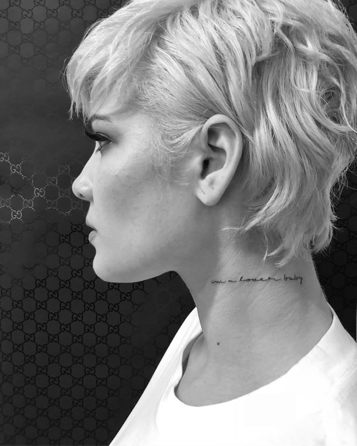 Halsey with a new JonBoy neck tattoo. Photo: @jonboytattoo/Instagram