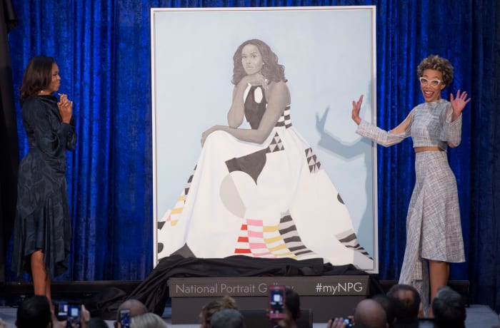 Michelle Obama and artist Amy Sherald unveil Mrs. Obama's portrait at the Smithsonian's National Portrait Gallery in Washington, D.C. on Monday. Photo: Saul Loeb/AFP/Getty Images