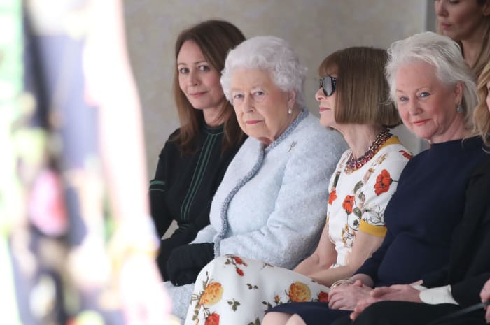 Queen Elizabeth II attends Richard Quinn's London Fashion Week show with Chief Executive of the British Fashion Council, Caroline Rush, and Anna Wintour on Tuesday. Photo: Mike Marsland/WireImage