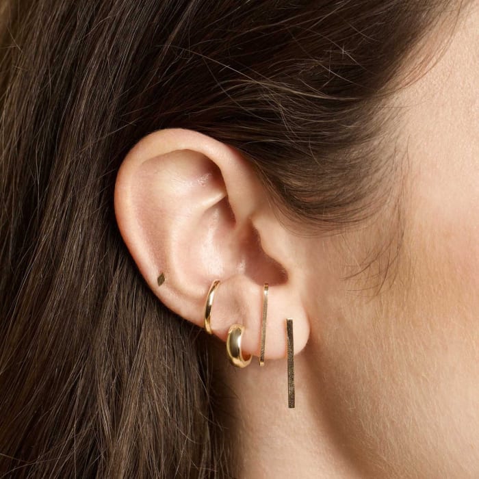 Stone & Strand Bold Gold Huggie Earrings, $150, available here. Photo: Courtesy of Stone & Strand
