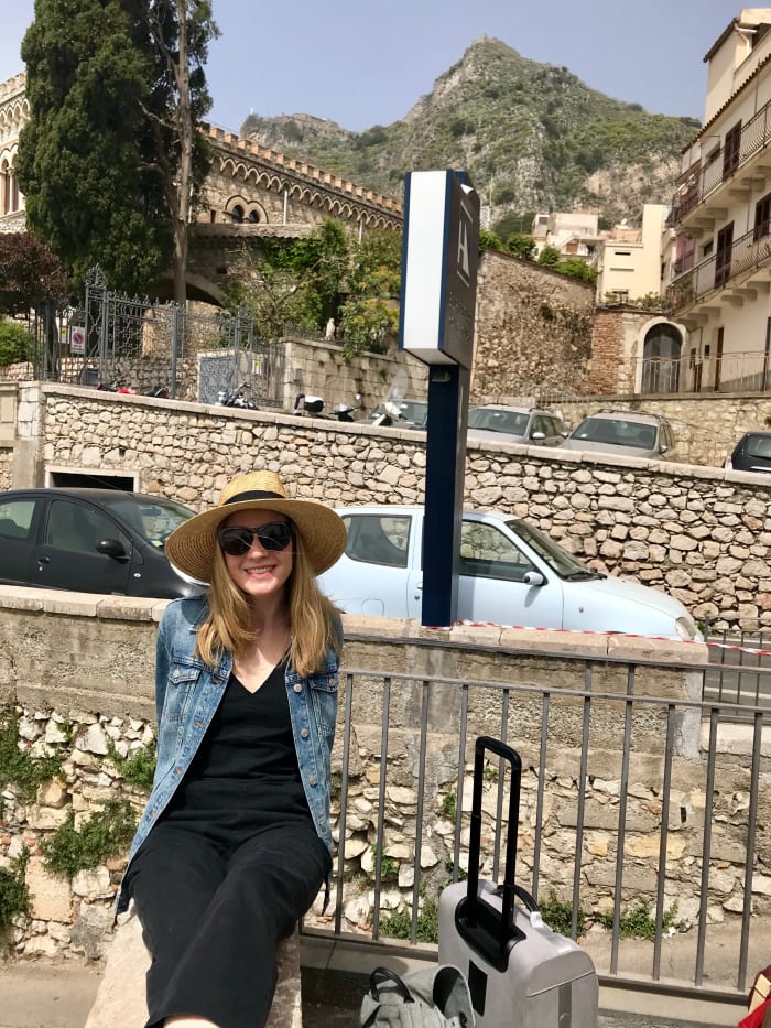 Anne Olivia Bauso, editor at the expert packing site What To Pack, and her luggage in Sicily. Photo: Courtesy of Anne Olivia Bauso