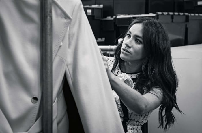 The Duchess of Sussex in Gucci in the workroom of the Smart Works London office. Photo: @SussexRoyal/Kensington Palace/AFP