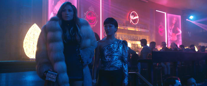 Ramona in a Marc Kaufman Furs coat and The Blonds dress and carrying a Judith Leiber clutch. Destiny in a bebe top and vintage leather pants. Photo: Courtesy of STXfilms