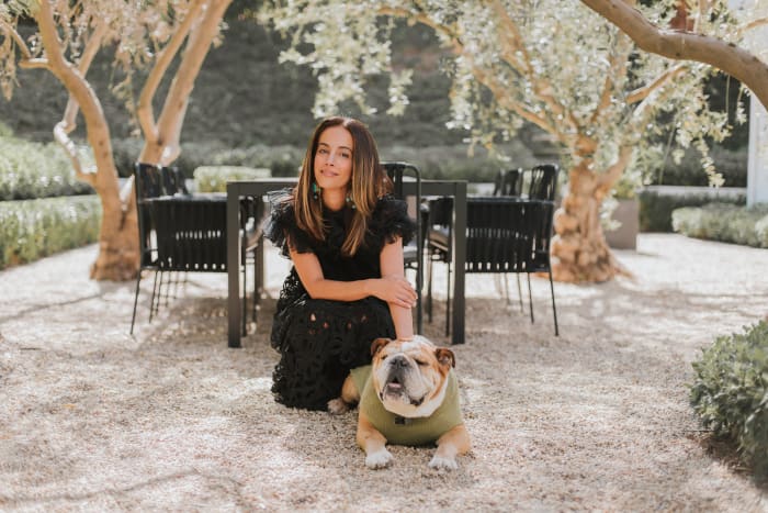 Max-Bone founder and CEO Parisa Fowles-Pazdro with her English bulldog, Macintosh. Photo: Courtesy of Max-Bone