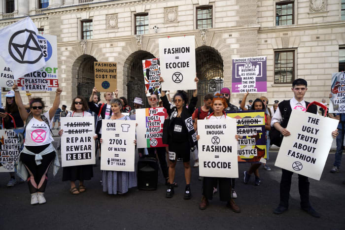 Extinction Rebellion protestors at London Fashion Week.