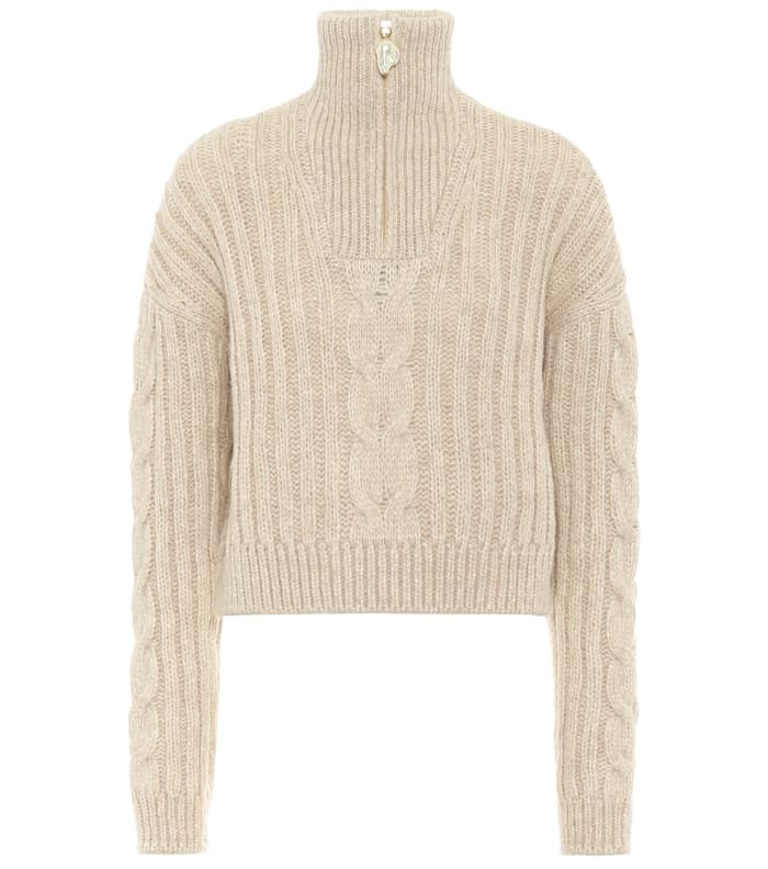 Nanushka Eria Wool-Blend Turtleneck Sweater, $395, available here.