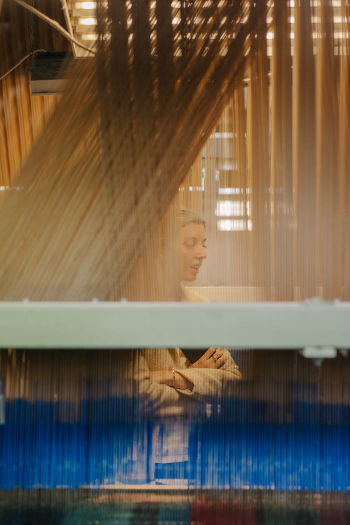 Hewitt visiting one of her line's fabric production partners. Photo: Motion Sickness/Courtesy of Somewhere