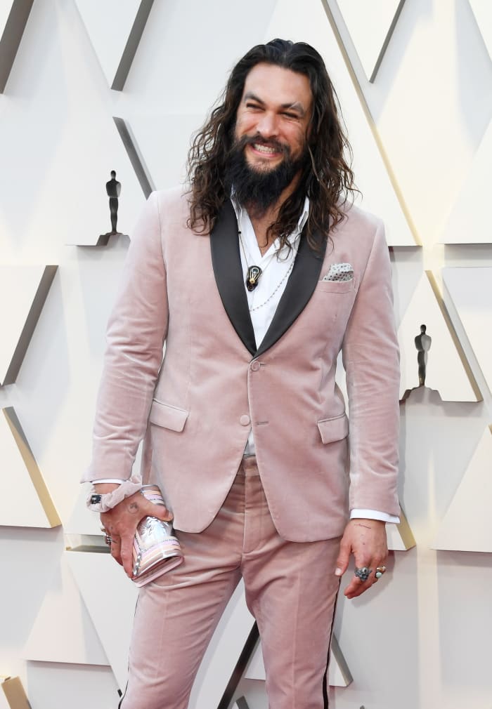 Jason Momoa in Fendi — complete with a matching scrunchie — at the 2019 Oscars. Photo: Frazer Harrison/Getty Images