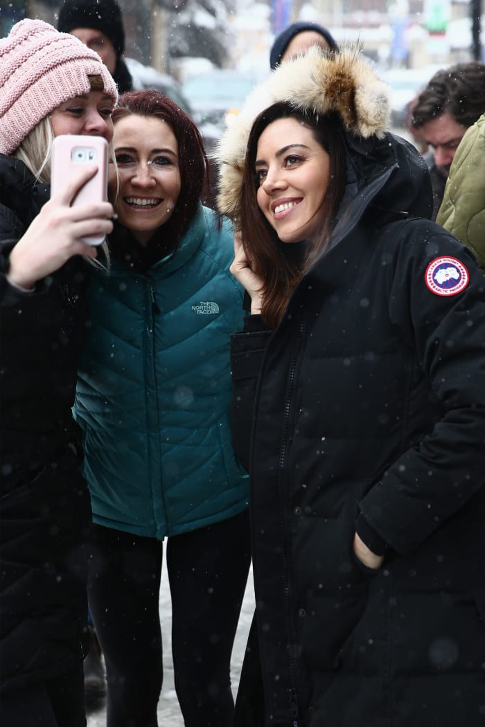 Aubrey Plaza (right) takes a selfie with fans at the 2018 Sundance Film Festival.