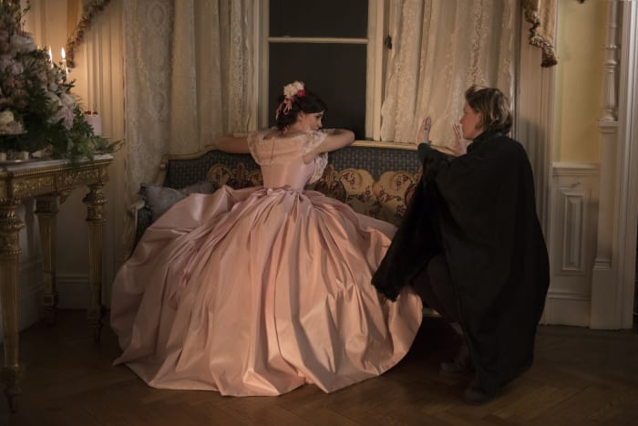 Watson as Meg receives direction from Greta Gerwig for the Boston debutante ball scenes.