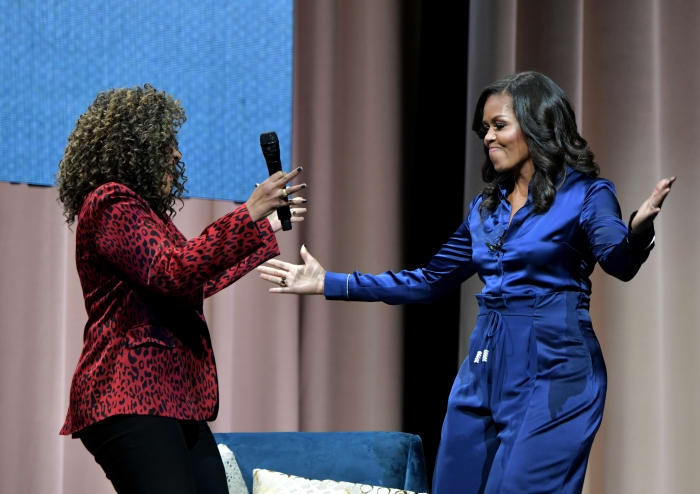 Michelle Obama in Cushnie with Michelle Norris on her book tour in Boston, Massachusetts. Photo: Paul Marotta/Getty Images