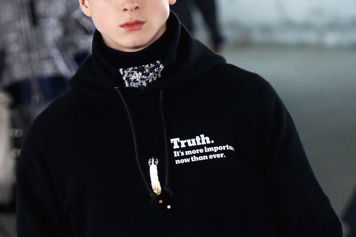 A "The New York Times"-branded sweatshirt on the runway during Sacai's Fall 2018 runway show during Paris Fashion Week Men's in January 2018. Photo: Francois Guillot/AFP/Getty Images