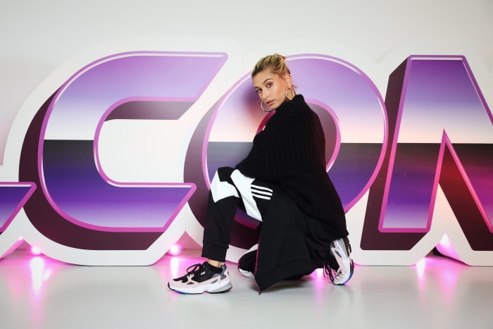 Hailey Baldwin in a pair of Adidas Falcon sneakers at the Adidas x JD show in London. Photo: Tristan Fewings/Getty Images