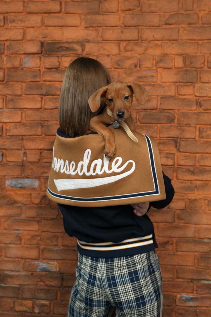 Cat McNeil with Katniss, available for adoption via Animal Haven Shelter, in Monse's Pre-Fall 2019 lookbook. Photo: Courtesy of Monse
