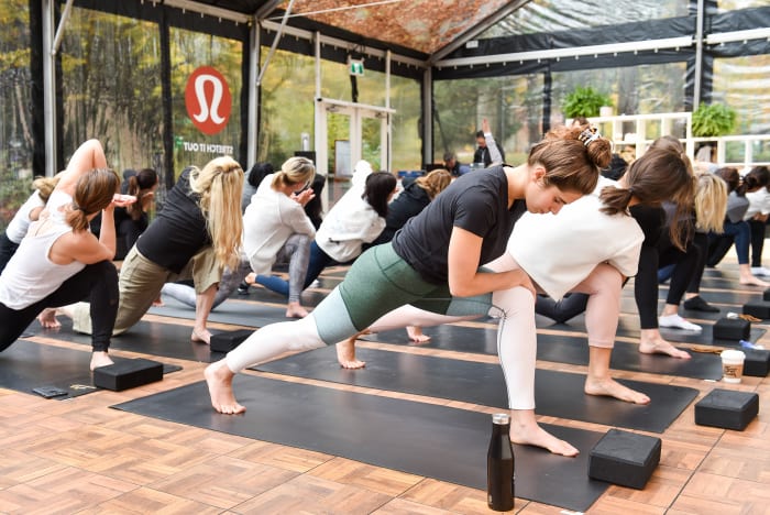 Yoga class at the Lululemon Yoga tent at In Goop Health Vancouver. Photo: Ernesto Distefano/Getty Images