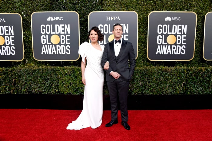 Hosts Sandra Oh in Atelier Versace and Andy Samberg in Brunello Cucinelli at the 76th Annual Golden Globe Awards. Photo: Frazer Harrison/Getty Images