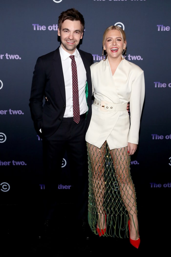 Yorke, with Drew Tarver, who plays Brooke's brother, Cary on 'The Other Two,' in a Rachel Comey dress and Steve Madden heels at the premiere of 'The Other Two.' 'I don't want to poop on them, but Louboutins are expensive and uncomfortable. They're so deeply uncomfortable, it's psychotic,' says Yorke, about buying affordable footwear. Photo" Astrid Stawiarz/Getty Images for Comedy Central