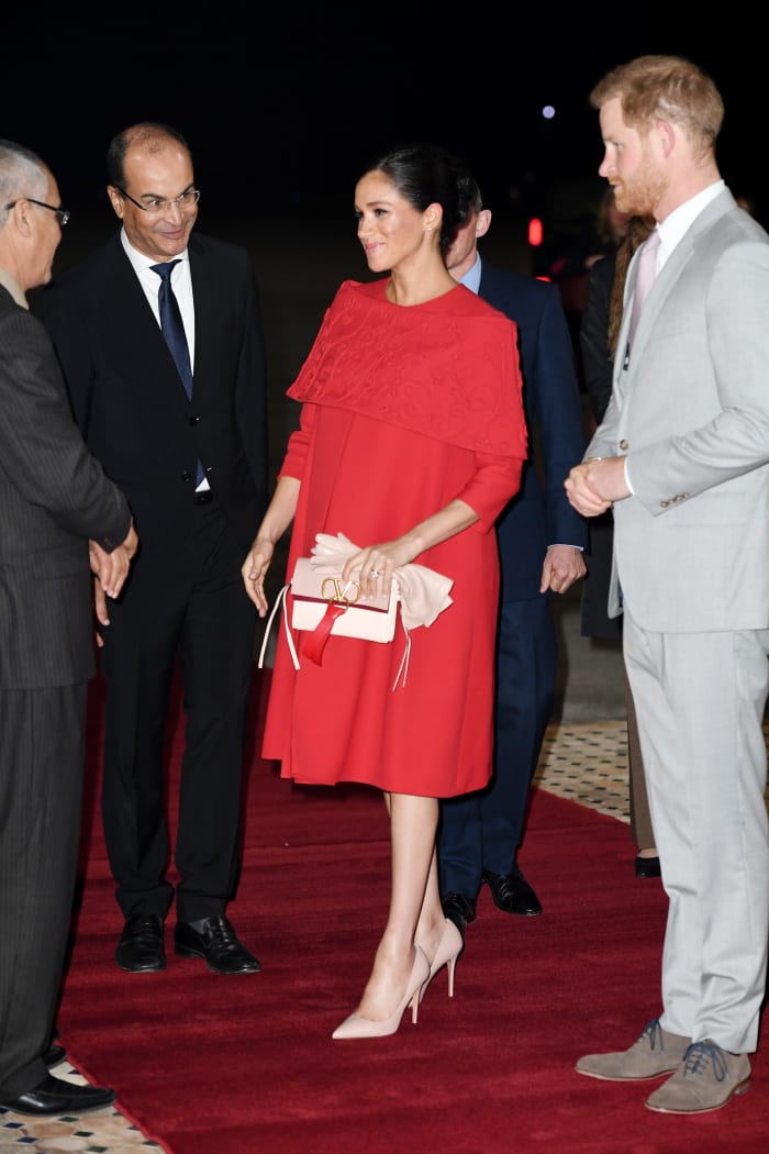 Meghan Markle (in custom Valentino) and Prince Harry arrive at Casablanca airport in Morocco. Photo: Pool/Samir Hussein/WireImage
