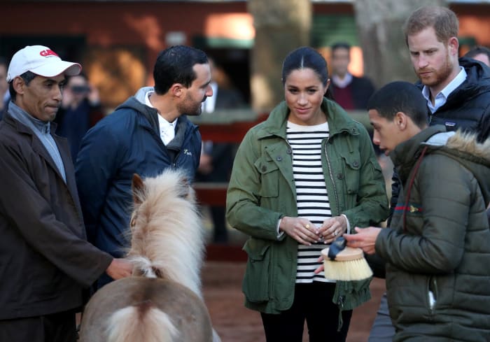 Meghan Markle in a J.Crew jacket at the Moroccan Royal Federation of Equitation Sports in Rabat, Morocco. Photo: Hannah Mckay - Pool / Getty Images
