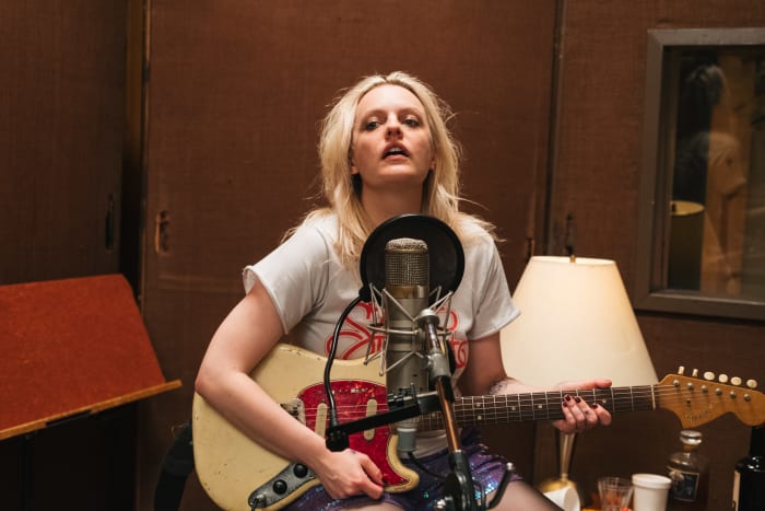 Becky She (Elisabeth Moss) in a vintage T-shirt reading "Sweet Potato." Photo: Don Stahl/Courtesy of Gunpowder & Sky