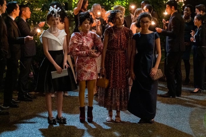 Shay Rudolph as Stacey, Momona Tamada as Claudia, Xochitl Gomez as Dawn and Baker as Mary Anne at the big wedding in 'The Baby-Sitters Club.'