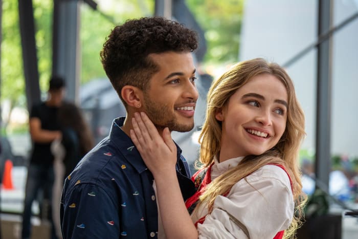 Jordan Fisher (Team John Ambrose!) as Jake Taylor and Sabrina Carpenter as Quinn Ackerman in 'Work It.'
