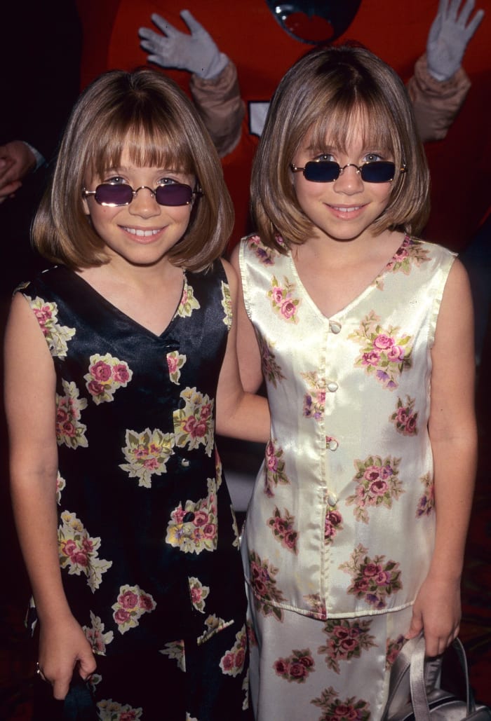 Mary-Kate Olsen and Ashley Olsen at the Audrey Hepburn for Children Family Film Festival in 1997.