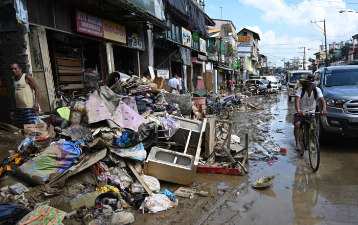 A street in Marikina covered in debris and mud in the aftermath of typhoon-induced flooding and rains on November 13, 2020.