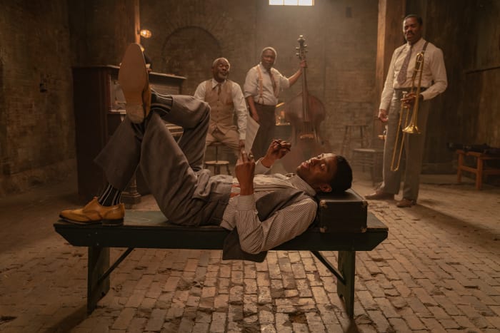 Levee (Chadwick Boseman, center), from left to right, Toledo (Glynn Turman), Slow Drag (Michael Potts) and Cutler (Colman Domingo).