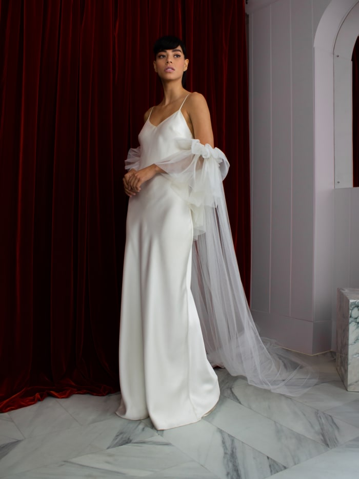 The Iris slip dress and Blaze cape from the Halfpenny London collection.