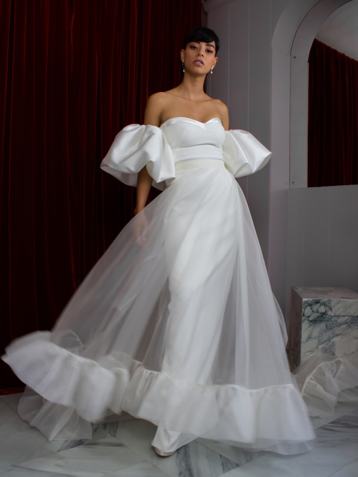 A Cosmic column dress, Moon overskirt and Sun puff sleeves from the Halfpenny London collection.