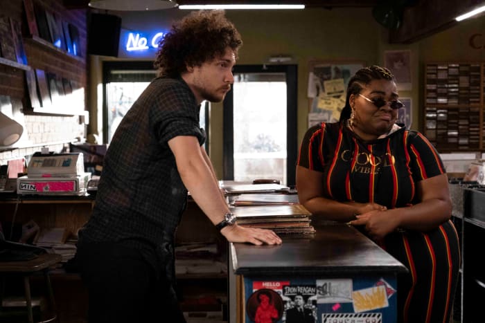 Simon (David H. Holmes) and Cherise probably judging a rare customer in Championship Vinyl.