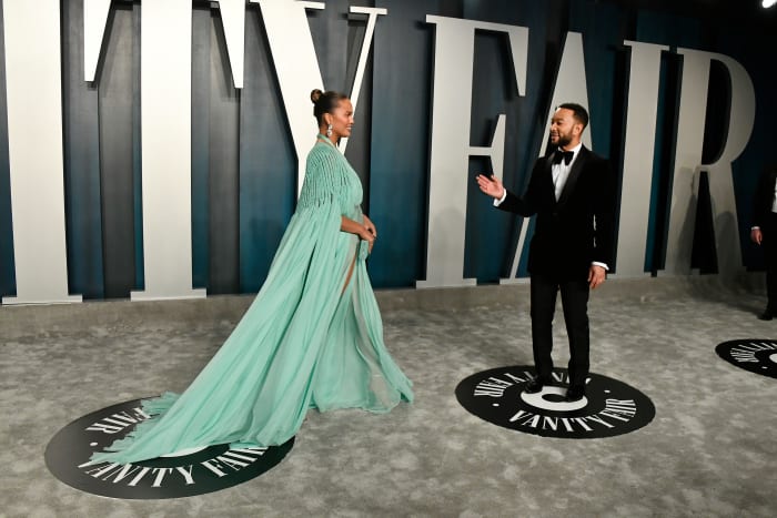 Chrissy Teigen and John Legend at the 2020 Vanity Fair Oscar Party in Beverly Hills, California.