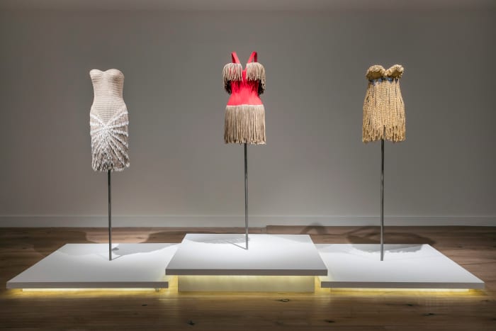(From L-R): Alaïa dresses from Summer 1990, Summer 1988 and the Tina Turner dress from Summer 1989 in 'Alaïa-Adrian: Masters of Cut.'