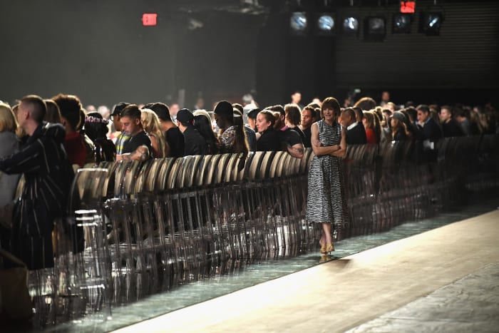 Anna Wintour in front of the chairs Marc Jacobs eventually donated to Materials for the Arts, which then passed them along to a local school's band program.