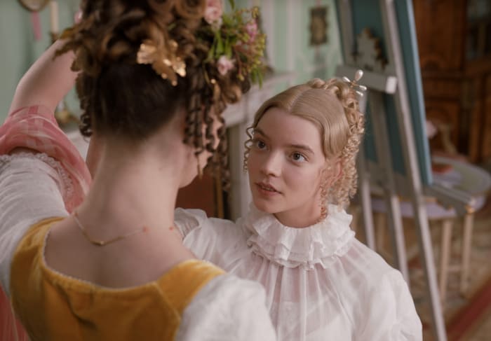 Emma (right) helps Harriet (left) pose for Mr. Elton's portrait painting session.