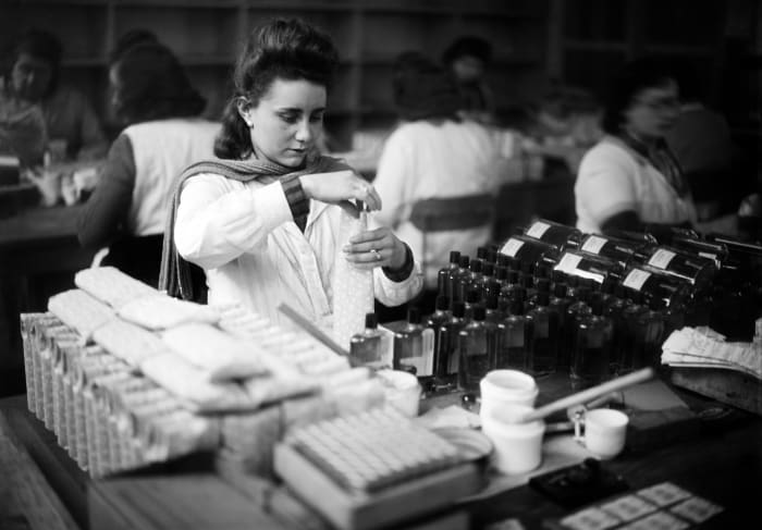 Workers work in the Lancôme perfume factory in Jan. 1945 in Courbevoie.