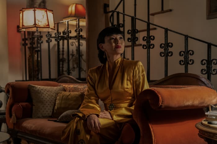 Anna May Wong (Michelle Krusiec) in her 'gold satin dressing gown situation.'