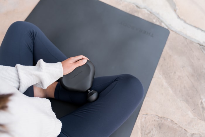 CBD Oil CBD Oil Theragun_mini_Female_Yoga Mat