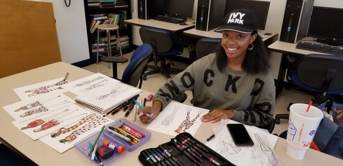 Marquelle Bowden, a recent graduate of Virginia State University's Textiles, Apparel and Merchandising Management (TAMM) program