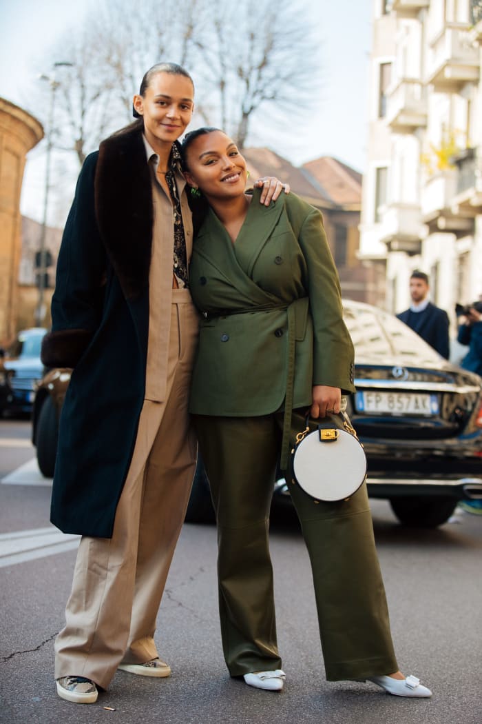 Models Binx Walton and Paloma Elsesser after Salvatore Ferragamo's Fall 2020 show during Milan Fashion Week.