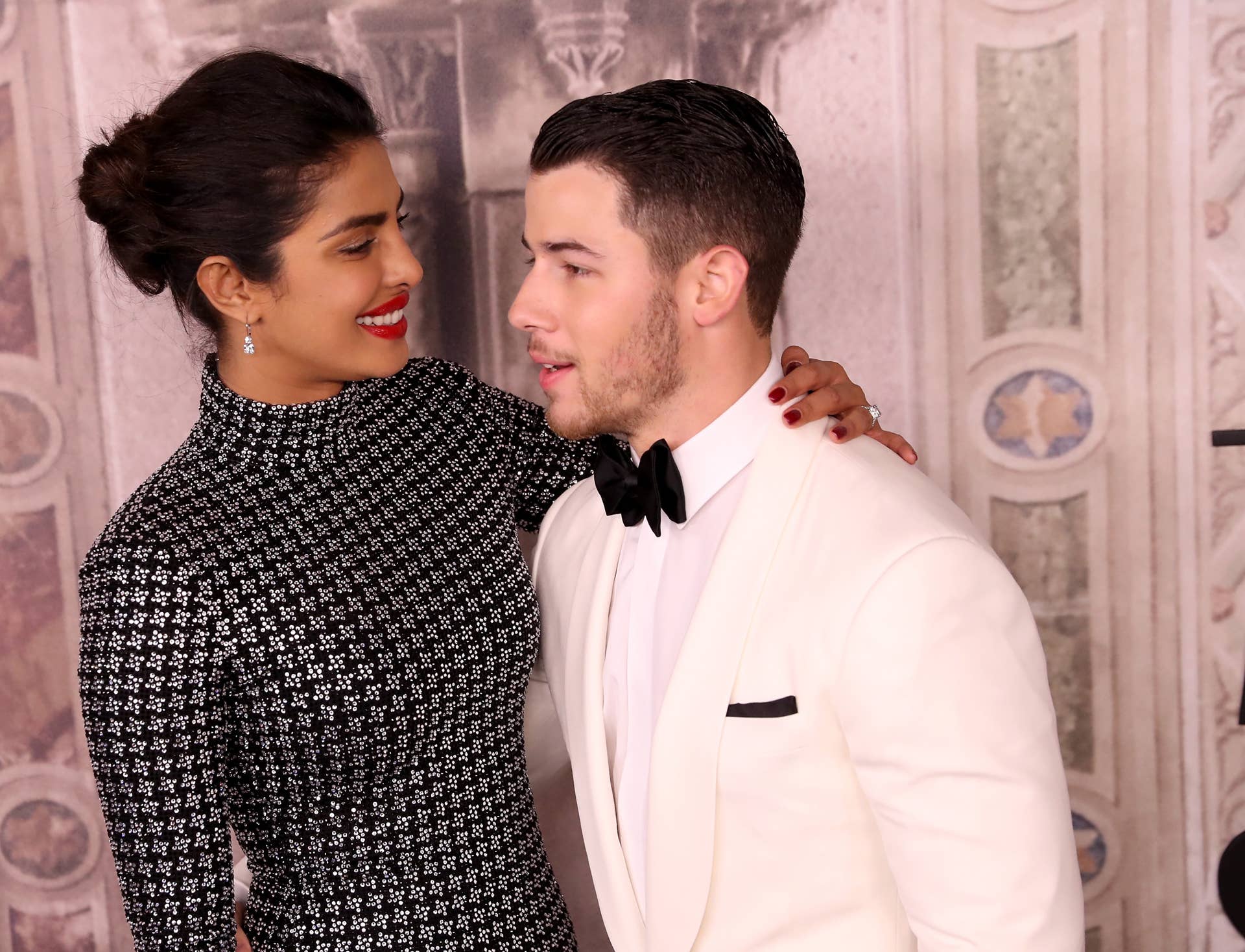 Priyanka Chopra and Nick Jonas attend the Ralph Lauren fashion show during New York Fashion Week